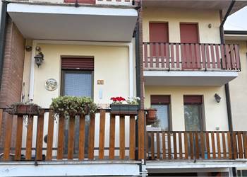 APPARTAMENTO CON GARAGE E GIARDINO PRIVATO
